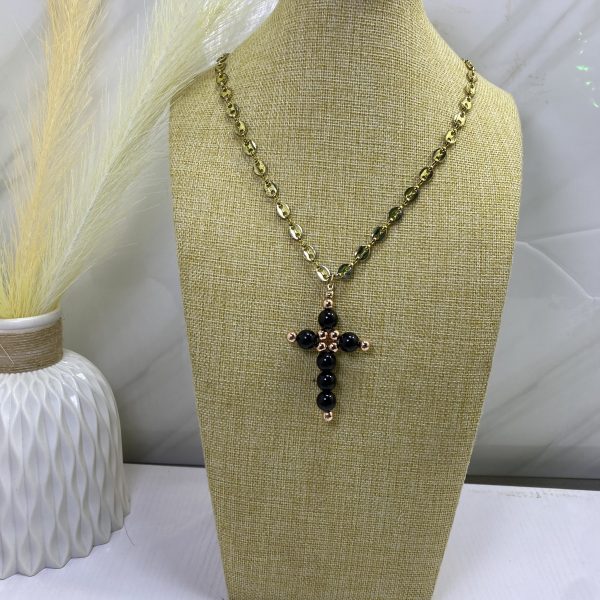 Sochi’s Éclat Dominus Cross Necklace