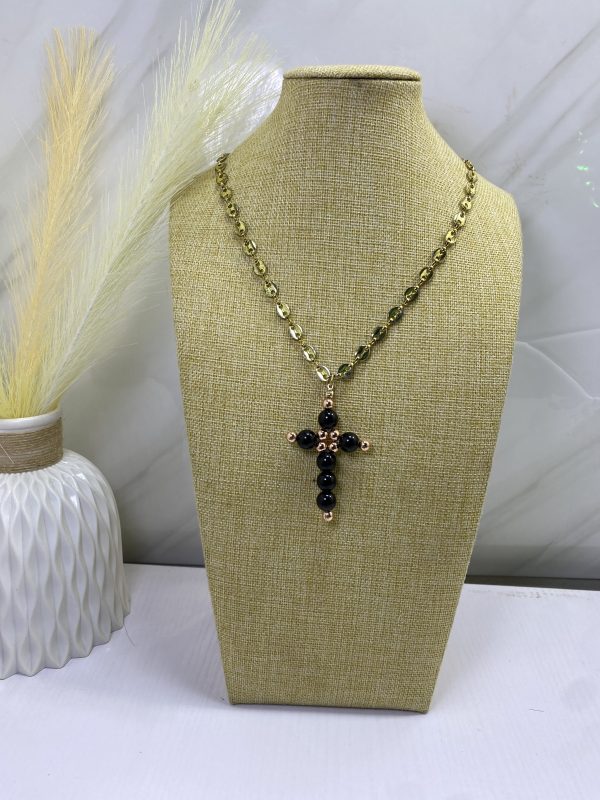 Sochi’s Éclat Dominus Cross Necklace